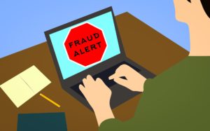 text på dataskärm med fraud alert